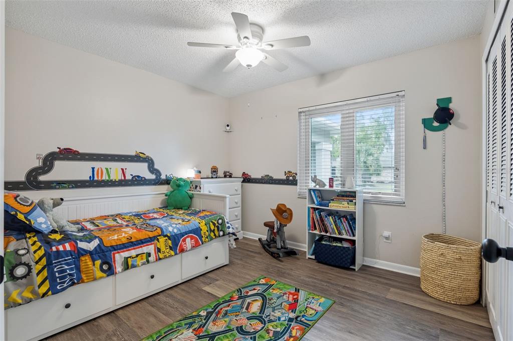 859 Benchwood Drive Winter Springs, FL 32708 - Photo 23 of 35 a bedroom with furniture and a baby crib