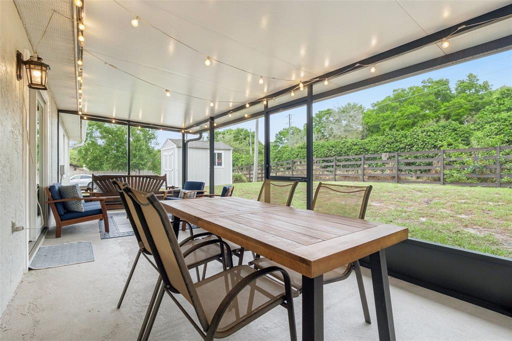 859 Benchwood Drive Winter Springs, FL 32708 - Photo 28 of 35 a view of a patio with table and chairs