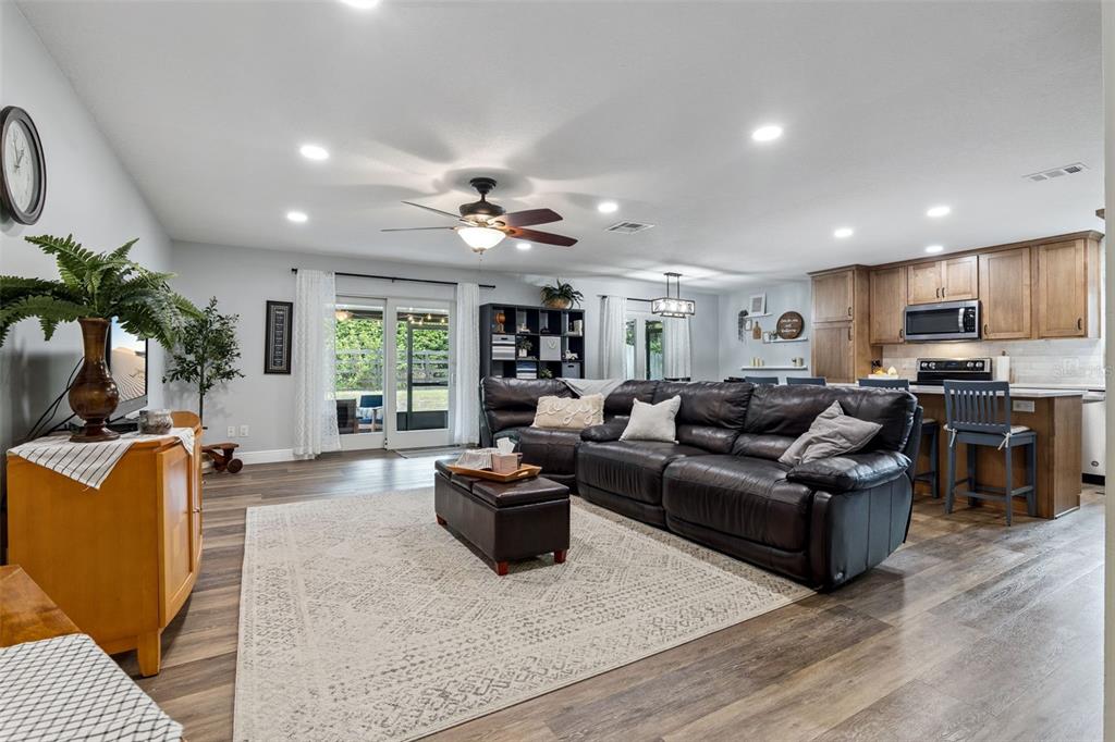 859 Benchwood Drive Winter Springs, FL 32708 - Photo 9 of 35 a living room with furniture and a wooden floor