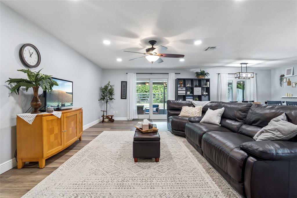 859 Benchwood Drive Winter Springs, FL 32708 - Photo 10 of 35 a living room with furniture ceiling fan and a window