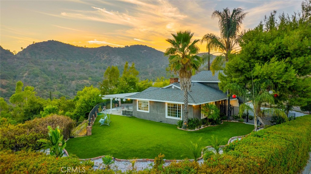 a view of a house with a garden