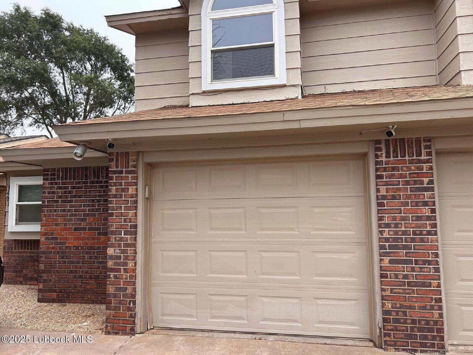 3421 Hyden Avenue Lubbock, TX 79407 - Photo 1 of 16 a front view of a house with a window