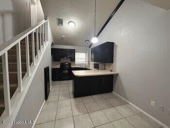 3421 Hyden Avenue Lubbock, TX 79407 - Photo 2 of 16 a kitchen with a sink and cabinets