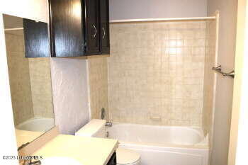 3421 Hyden Avenue Lubbock, TX 79407 - Photo 9 of 16 a bathroom with a bathtub and shower