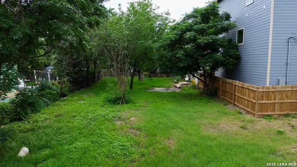 a view of a backyard with a garden