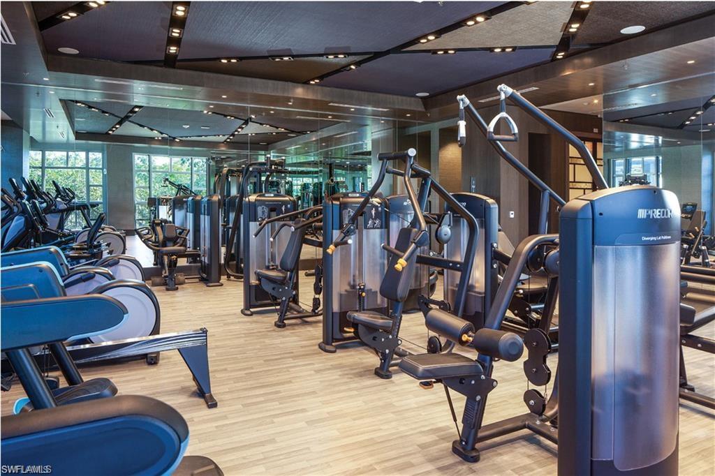 6897 Grenadier Boulevard, Unit 1101 Naples, FL 34108 - Photo 12 of 14 a view of a room with gym equipment