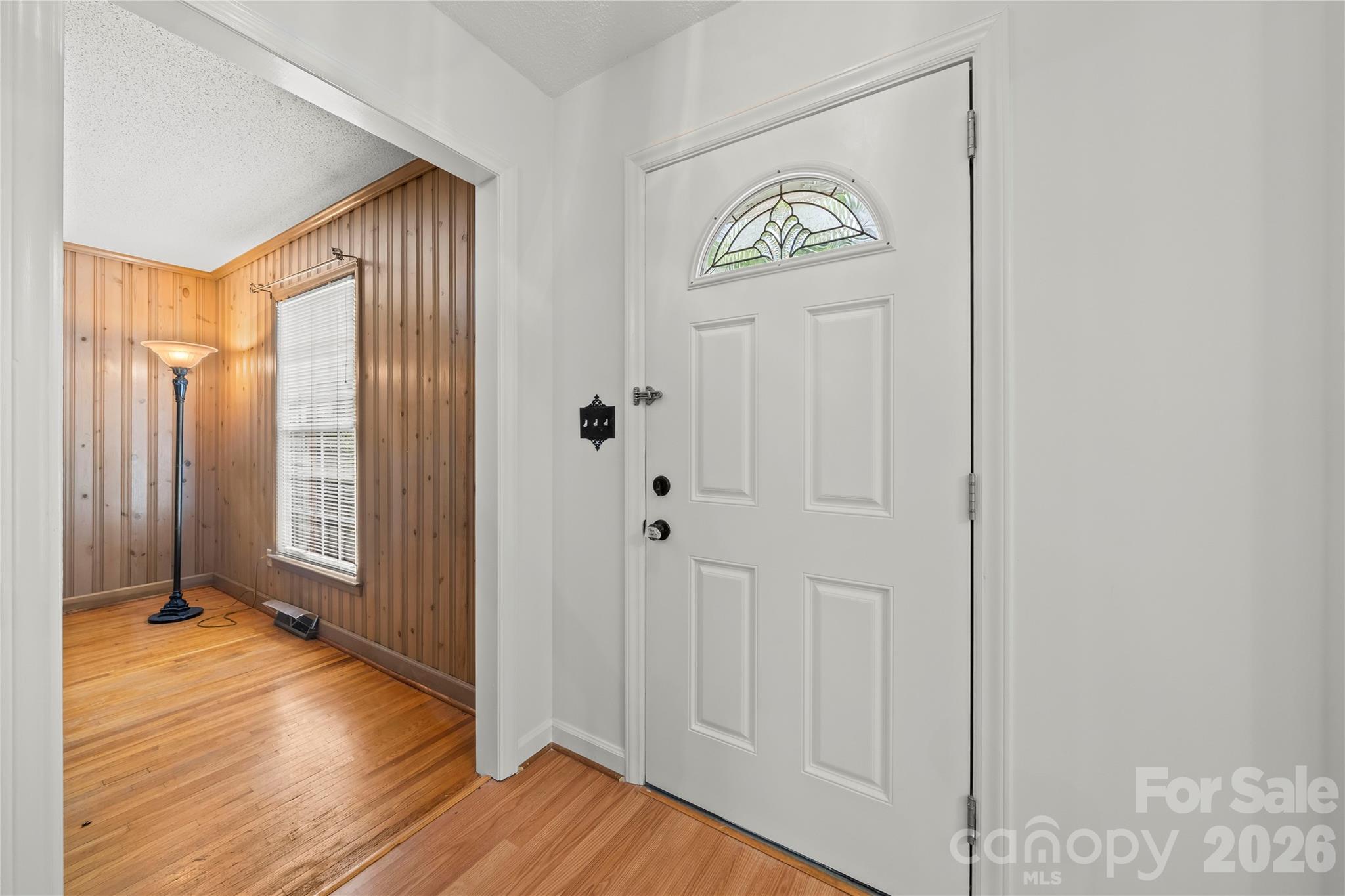 10670 Troutman Road Midland, NC 28107 - Photo 13 of 37 a view of a hallway with wooden floor