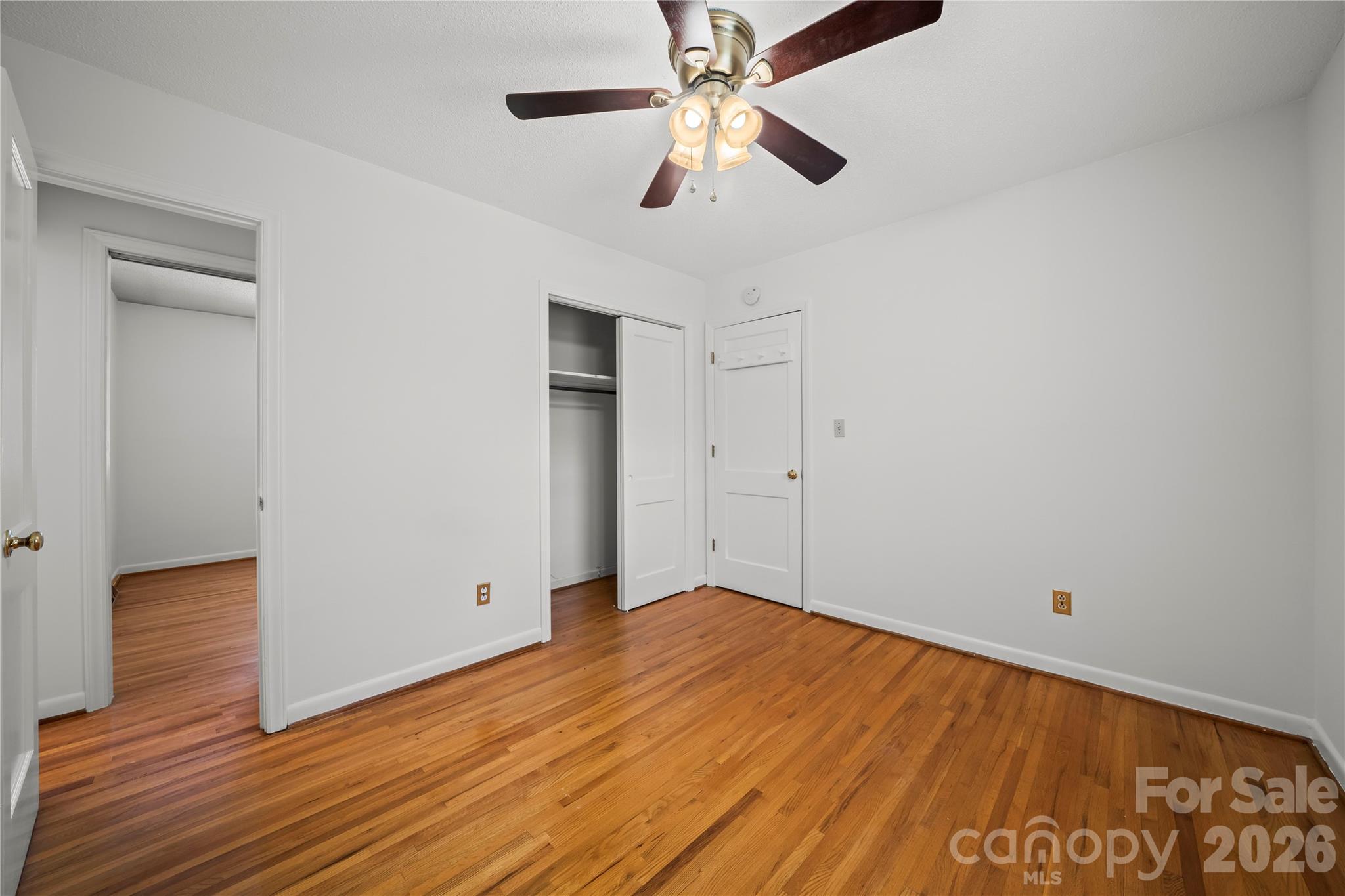 10670 Troutman Road Midland, NC 28107 - Photo 23 of 37 a view of empty room with wooden floor