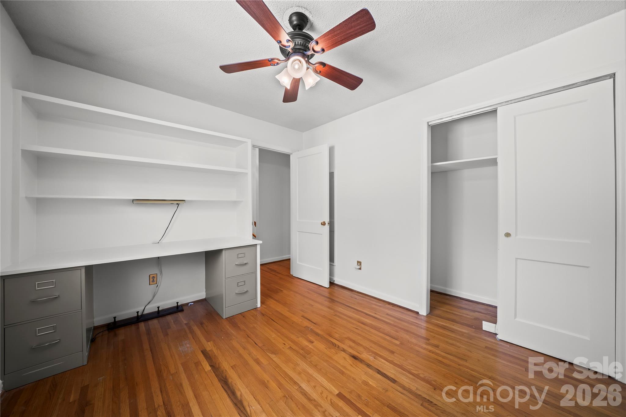 10670 Troutman Road Midland, NC 28107 - Photo 26 of 37 a view of an empty room with a window and wooden floor