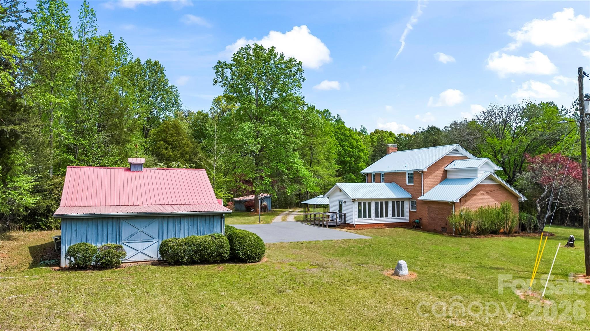 10670 Troutman Road Midland, NC 28107 - Photo 36 of 37 a house view with a garden space