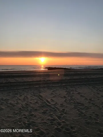 a view of a room next to a large building