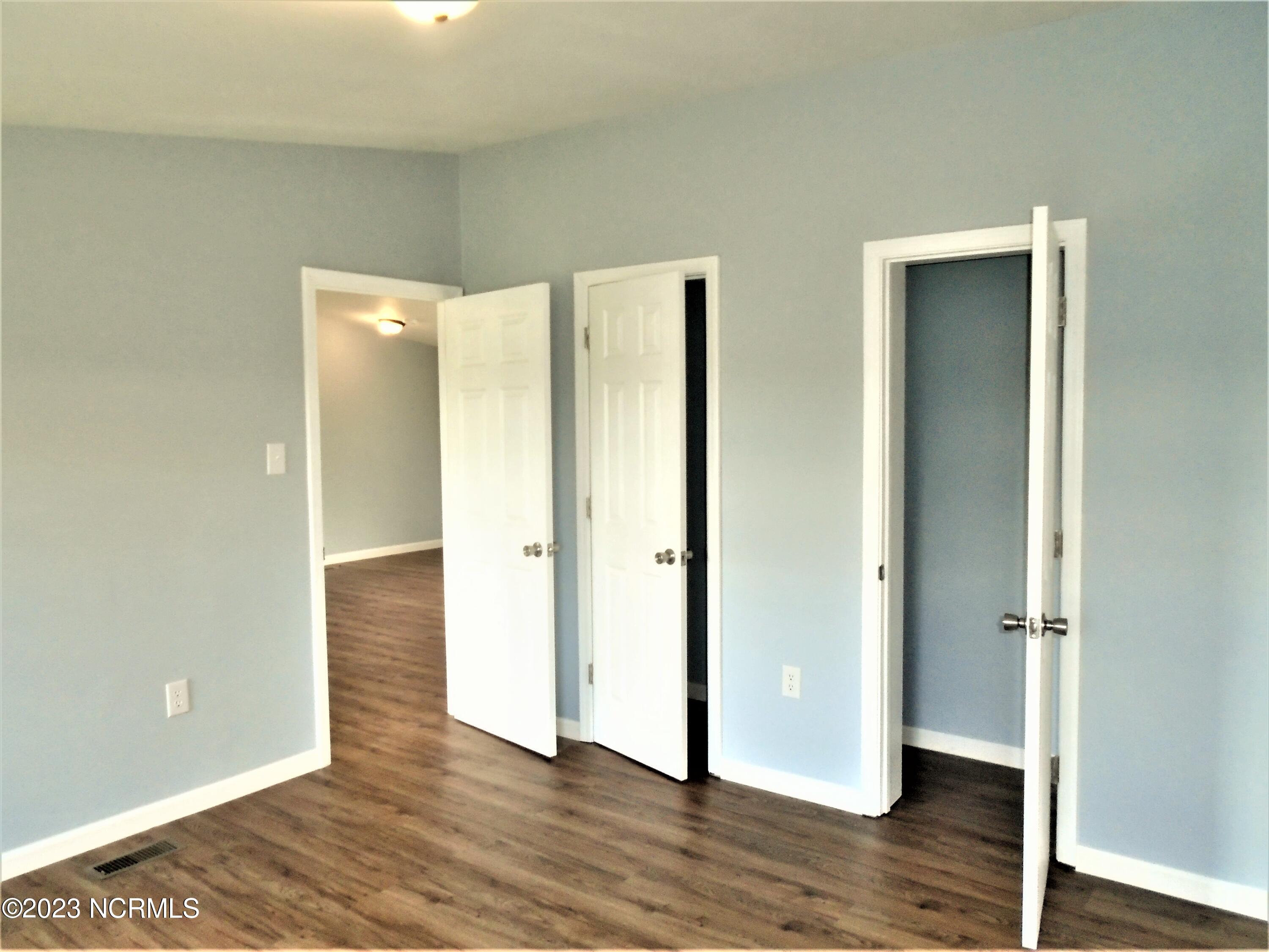 94 Sherlock Holmes Road Enfield, NC 27823 - Photo 22 of 26 Master Bedroom features double closets!