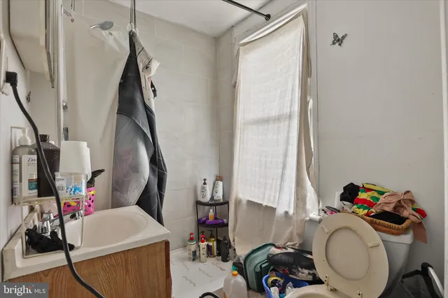 a view of a storage and utility room with toys