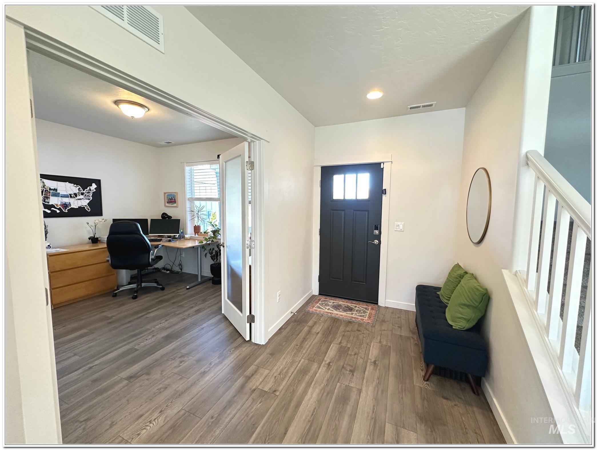 9687 West Arnold Road Boise, ID 83714 - Photo 16 of 49 Entryway featuring wood finished floors, plenty of natural light, and recessed lighting