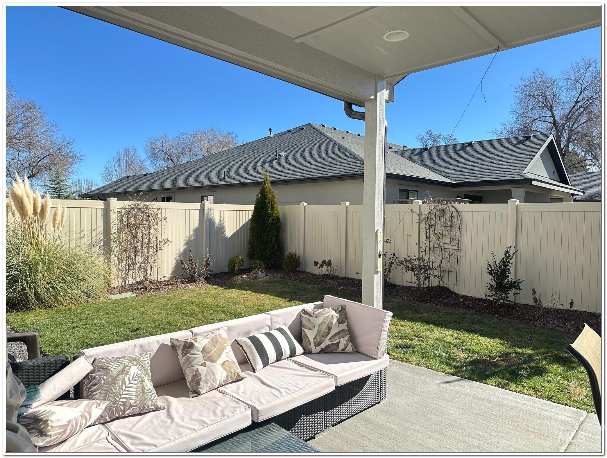 9687 West Arnold Road Boise, ID 83714 - Photo 42 of 49 Fenced backyard with outdoor furniture and a patio area