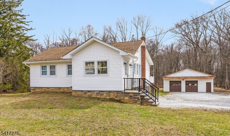 255 Dover Chester Road Randolph, NJ 07869 - Photo 1 of 37 a front view of a house with a yard