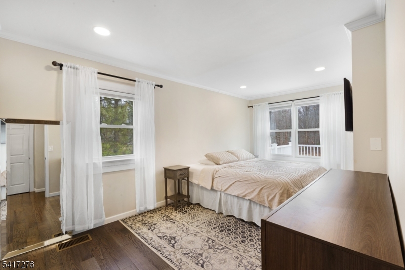 255 Dover Chester Road Randolph, NJ 07869 - Photo 15 of 37 a bedroom with bed and a window