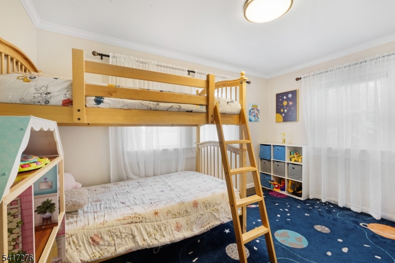 255 Dover Chester Road Randolph, NJ 07869 - Photo 17 of 37 a bedroom with a bed and a window