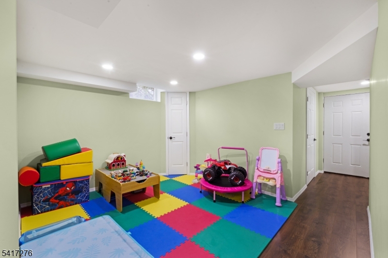 255 Dover Chester Road Randolph, NJ 07869 - Photo 22 of 37 a playing room with toys and dresser