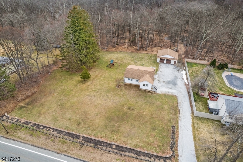 255 Dover Chester Road Randolph, NJ 07869 - Photo 31 of 37 a bathroom with a sink toilet and a mirror