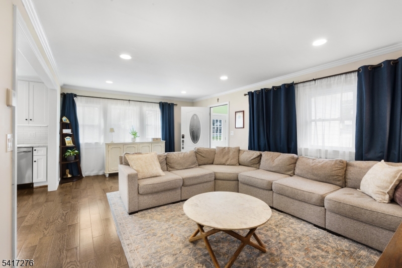 255 Dover Chester Road Randolph, NJ 07869 - Photo 5 of 37 a living room with furniture and a large window
