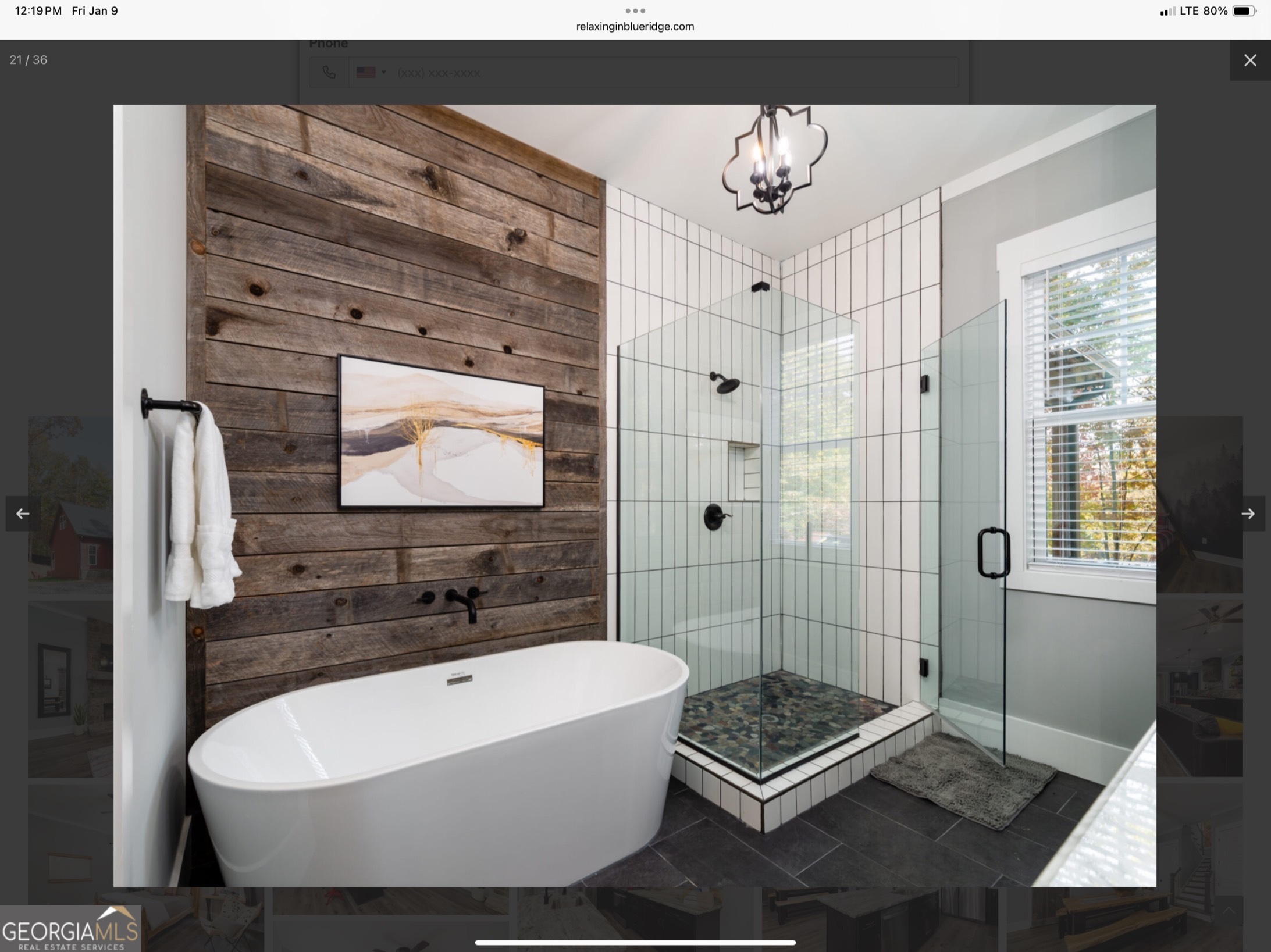 2055 Star Creek Road Morganton, GA 30560 - Photo 17 of 39 a bathroom with a bathtub a window and a shower