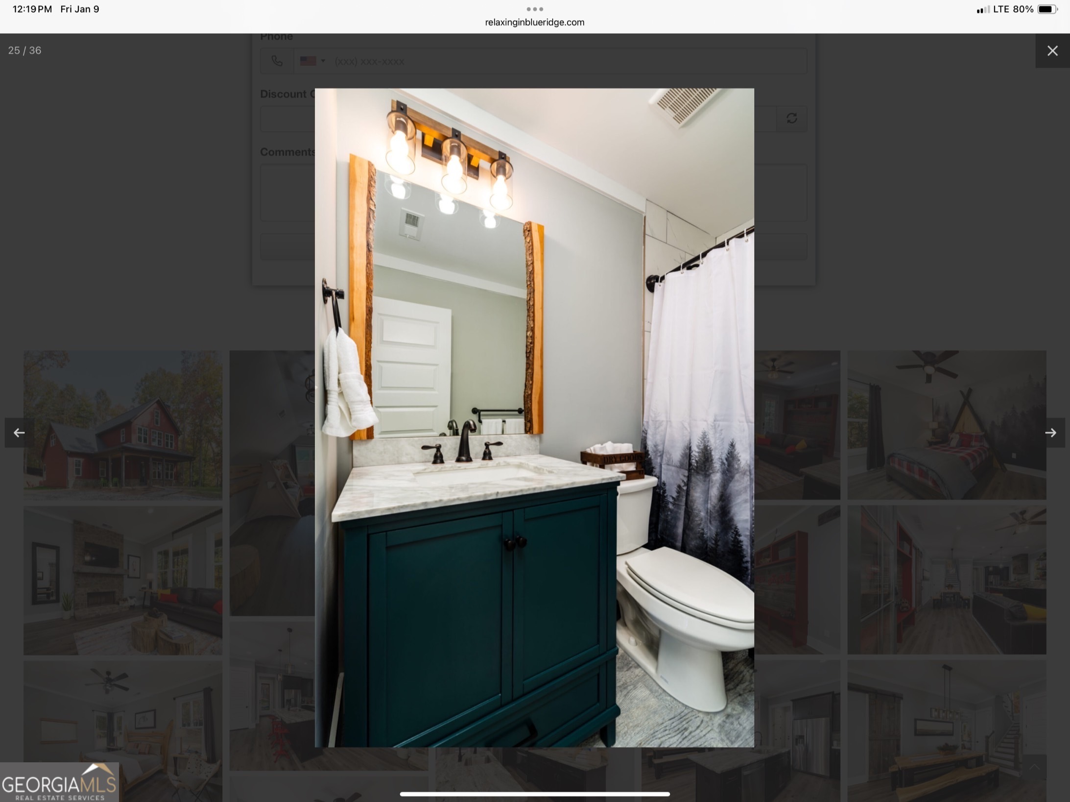 2055 Star Creek Road Morganton, GA 30560 - Photo 26 of 39 a bathroom with a sink mirror toilet and shower