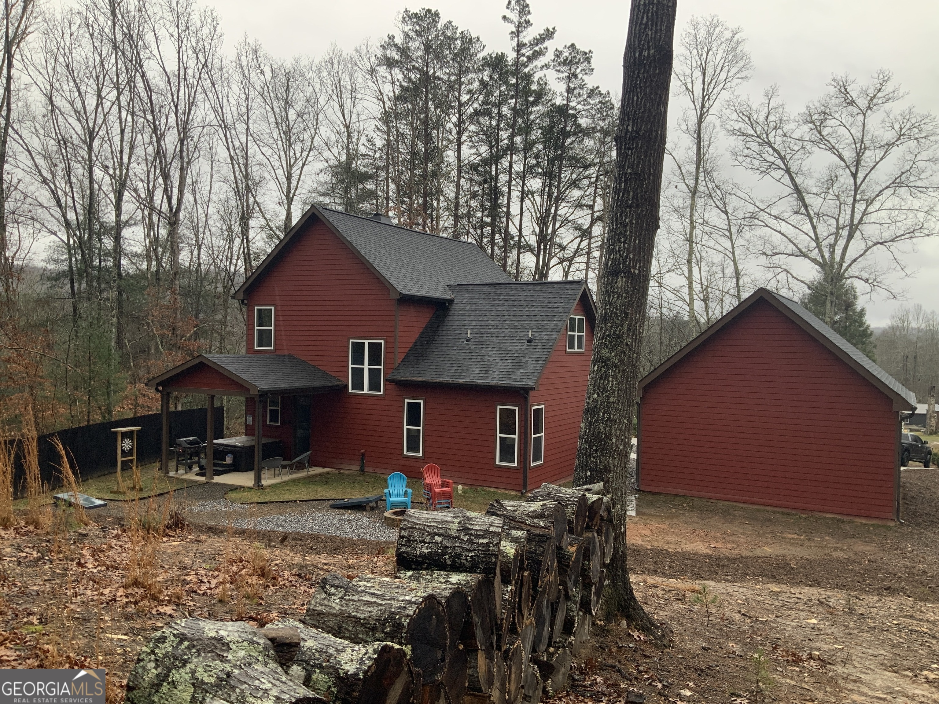 2055 Star Creek Road Morganton, GA 30560 - Photo 34 of 39 a front view of a house with yard and trees
