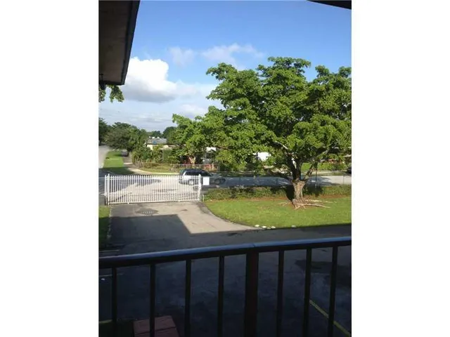 a view of a lake from a yard