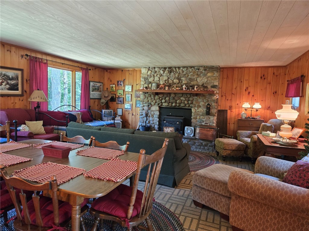 6964 Ross Road Canadice, NY 14560 - Photo 6 of 14 living room with beautiful stone fireplace with wo