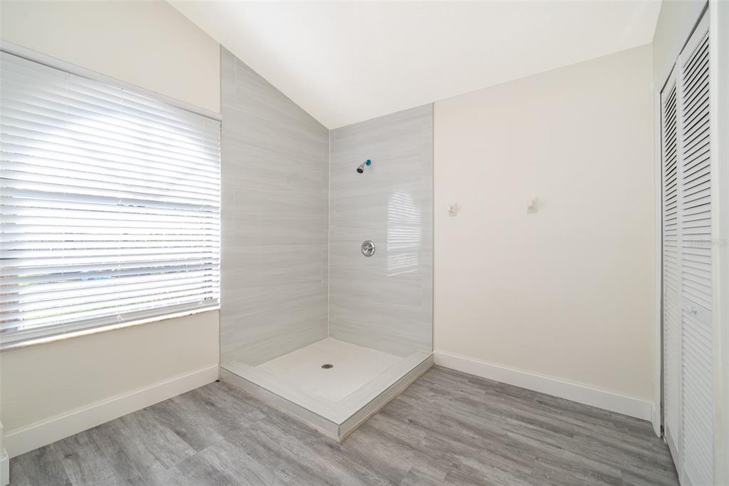 2006 Key Lime Street Ocoee, FL 34761 - Photo 22 of 28 wooden floor in an empty room with a window