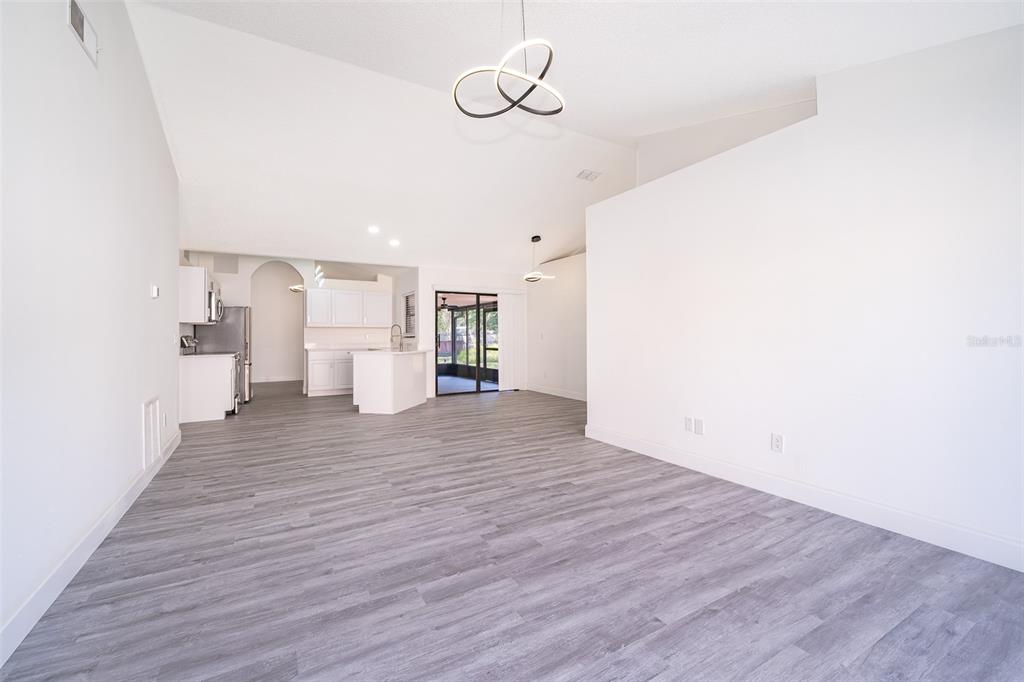 2006 Key Lime Street Ocoee, FL 34761 - Photo 6 of 28 a view of empty room with wooden floor