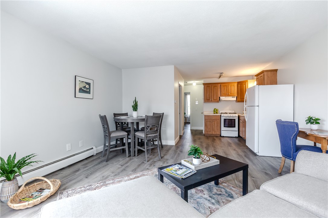 3940 Post Road, Unit 7 Warwick, RI 02886 - Photo 6 of 17 View from living room to the kitchen