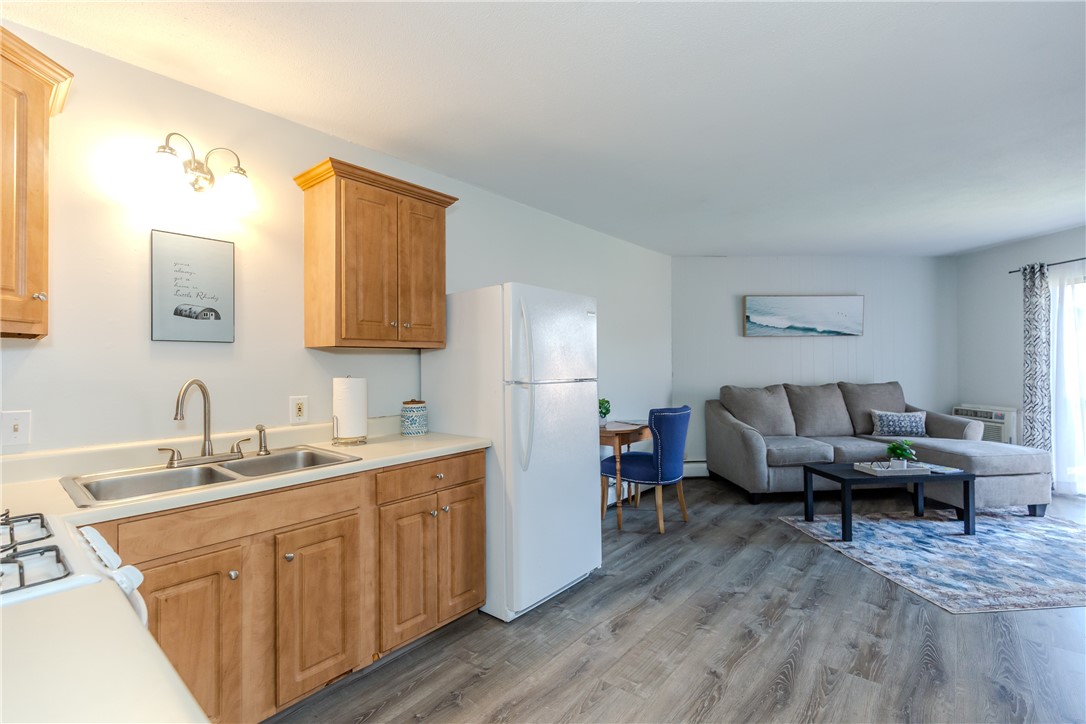 3940 Post Road, Unit 7 Warwick, RI 02886 - Photo 9 of 17 Kitchen view to the living room