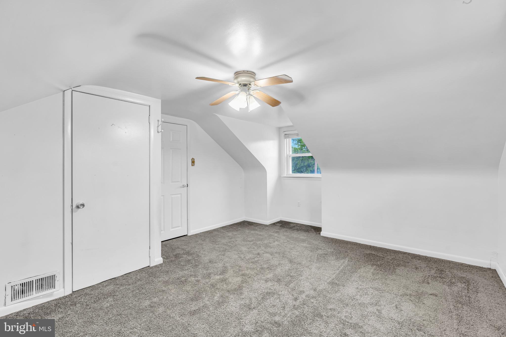 728 Filmore Street Riverside, NJ 08075 - Photo 23 of 41 an empty room with fan and windows