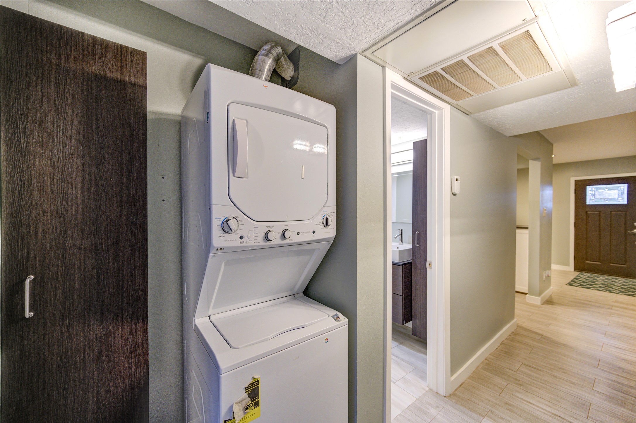 3224 Timmons Lane, Unit 155 Houston, TX 77027 - Photo 23 of 50 a view of living room washer and dryer
