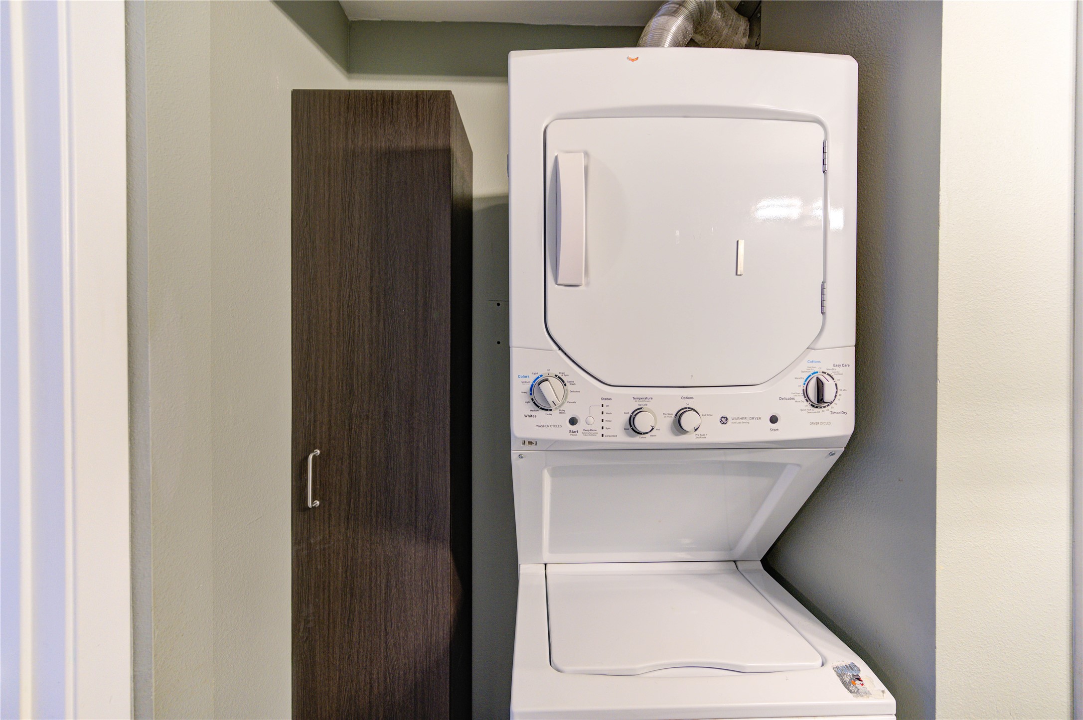 3224 Timmons Lane, Unit 155 Houston, TX 77027 - Photo 24 of 50 a utility room with dryer and washer