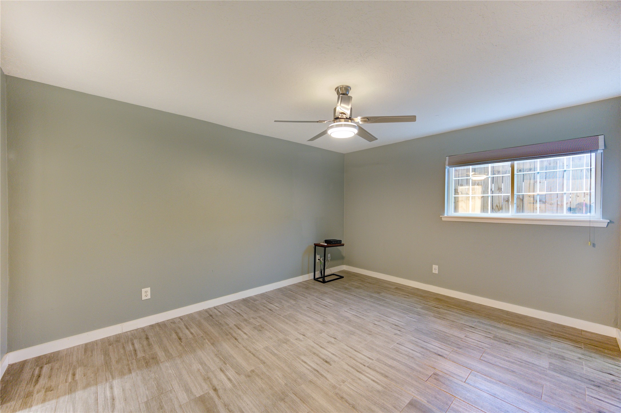 3224 Timmons Lane, Unit 155 Houston, TX 77027 - Photo 25 of 50 a view of an empty room with a window
