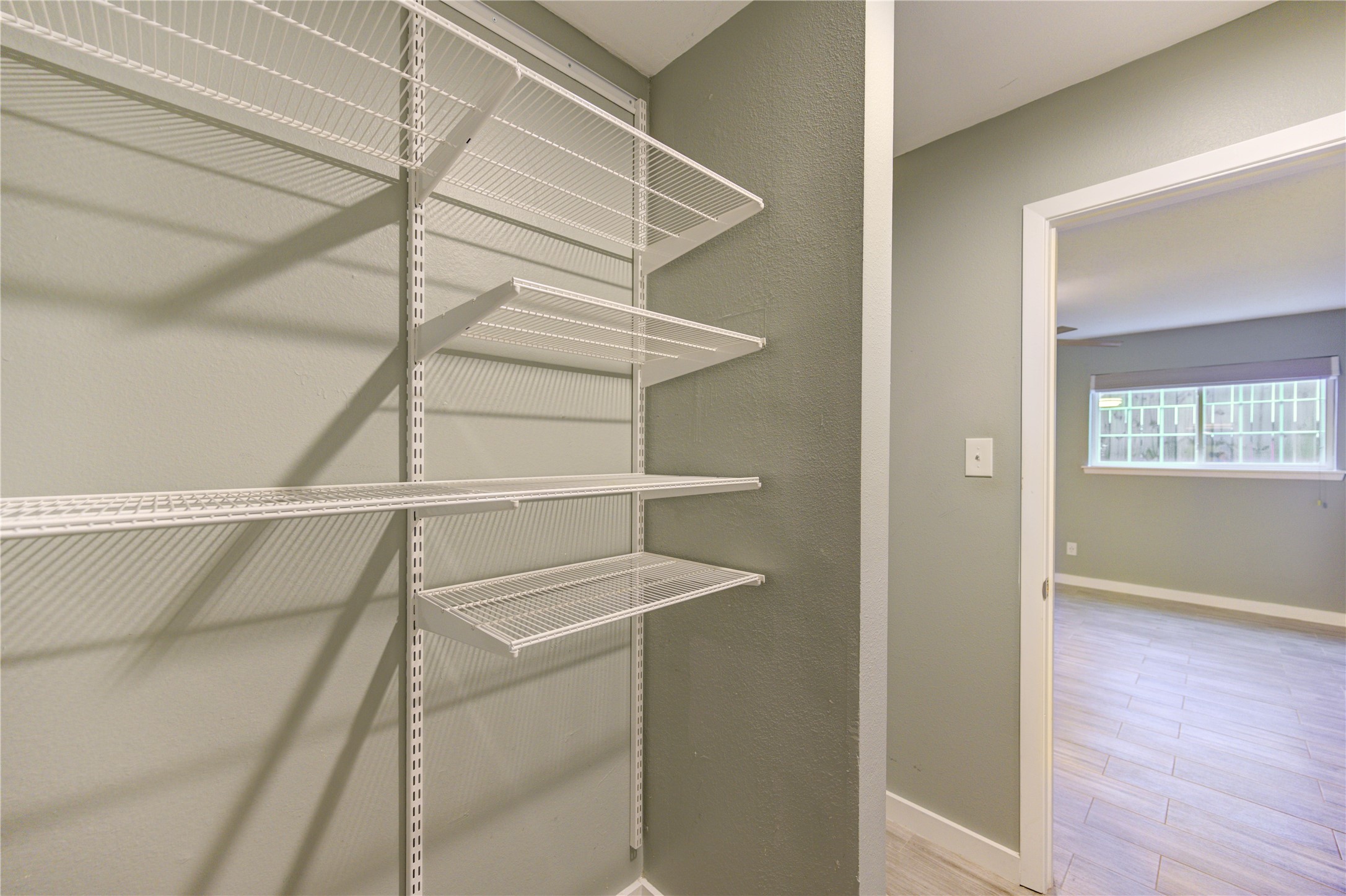 3224 Timmons Lane, Unit 155 Houston, TX 77027 - Photo 27 of 50 a view of an empty walk in closet