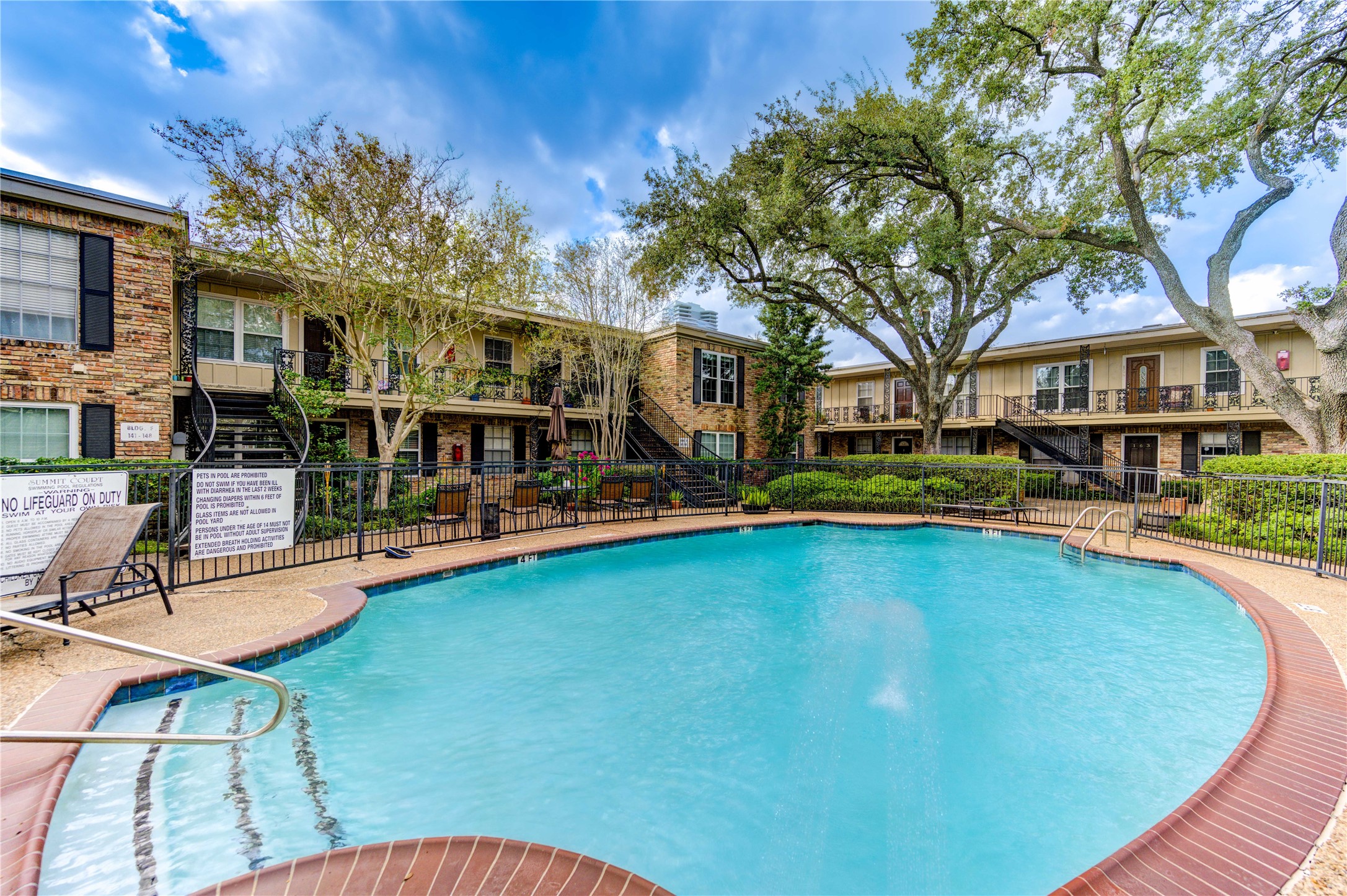 3224 Timmons Lane, Unit 155 Houston, TX 77027 - Photo 42 of 50 a view of outdoor space yard swimming pool and patio