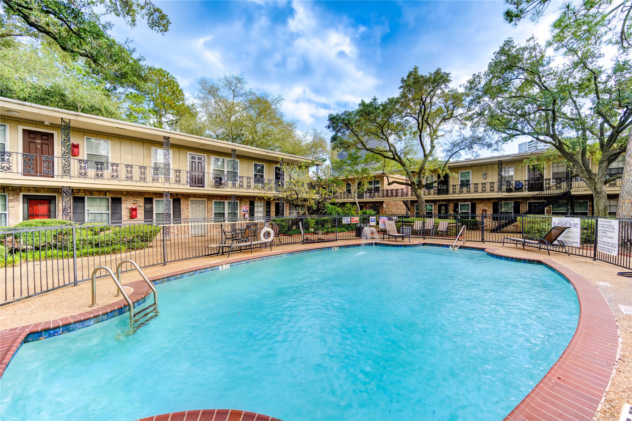 3224 Timmons Lane, Unit 155 Houston, TX 77027 - Photo 44 of 50 a view of house with outdoor space and sitting area