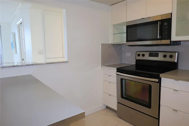a view of a living room and window