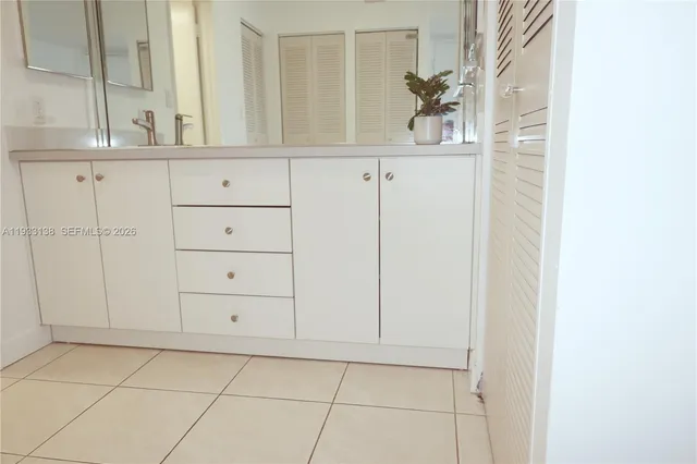 a bathroom with a sink a toilet and bathtub