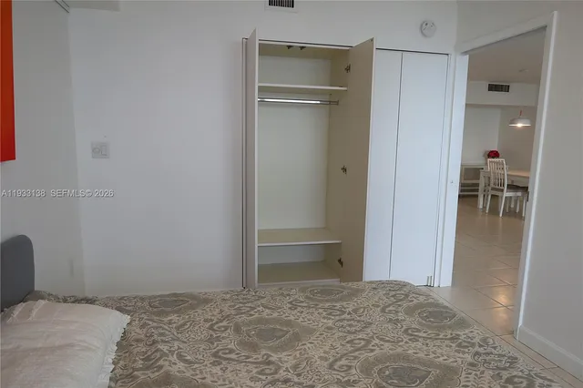 a bathroom with a double vanity sink and mirror