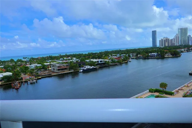 a view of a lake with building in front of it
