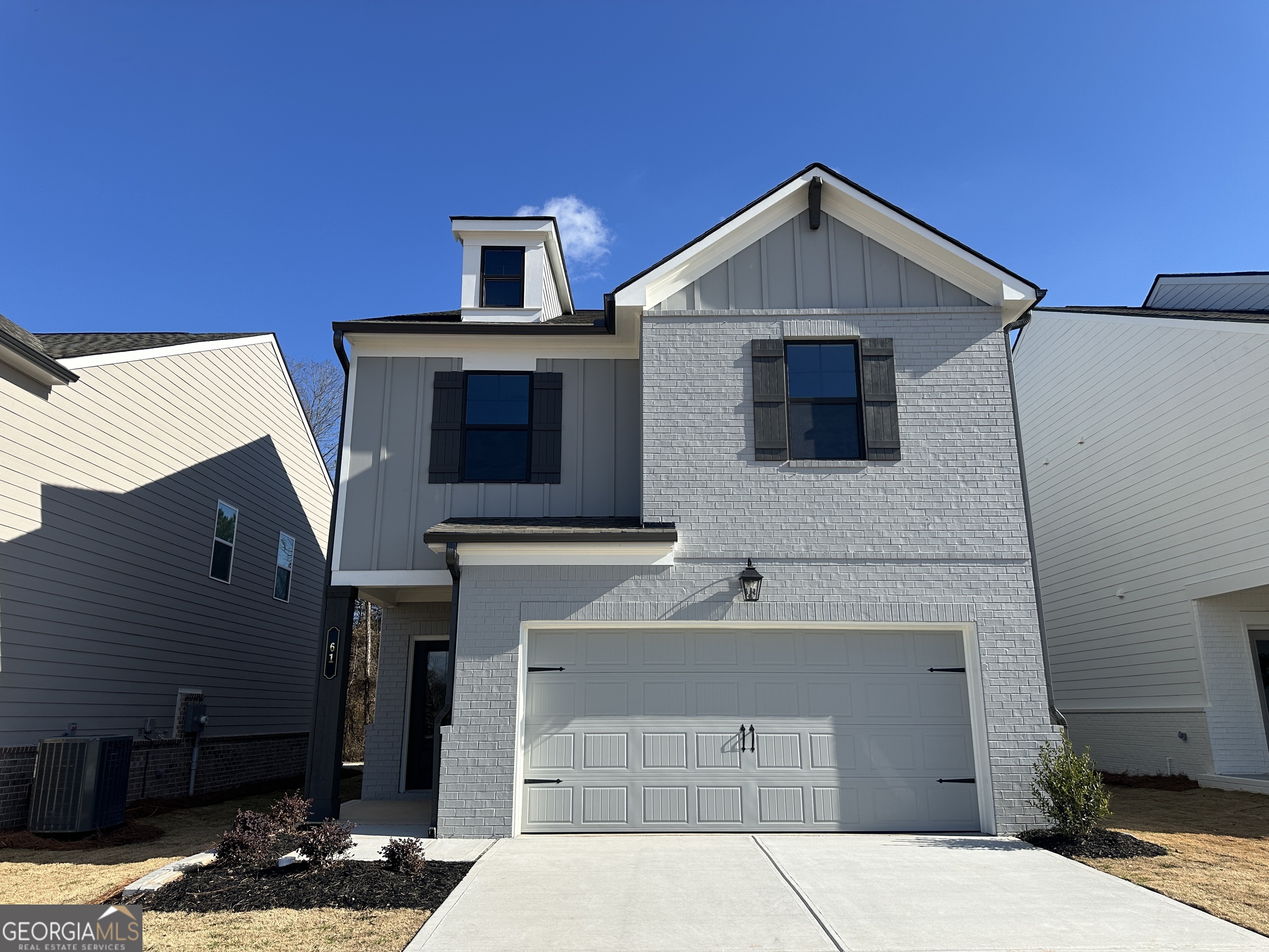61 Avian Way, Unit 12B Auburn, GA 30011 - Photo 1 of 1 a front view of a house with entertaining space