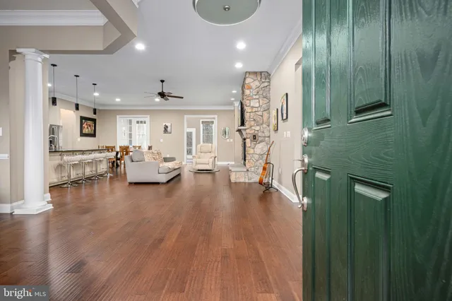 a view of a dining room with furniture and window