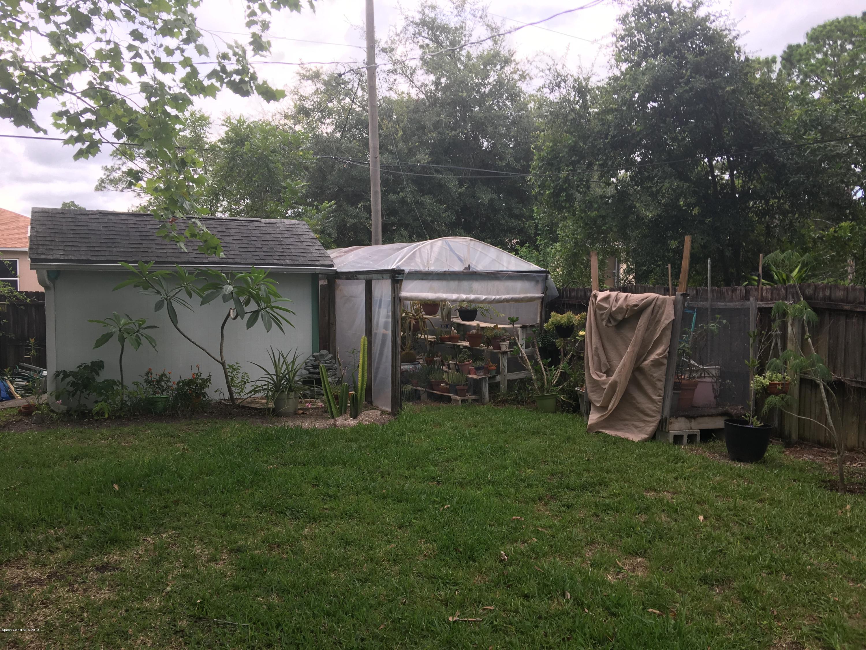 170 Santa Rosa Avenue Southwest Palm Bay, FL 32908 - Photo 25 of 32 back corner with shed
