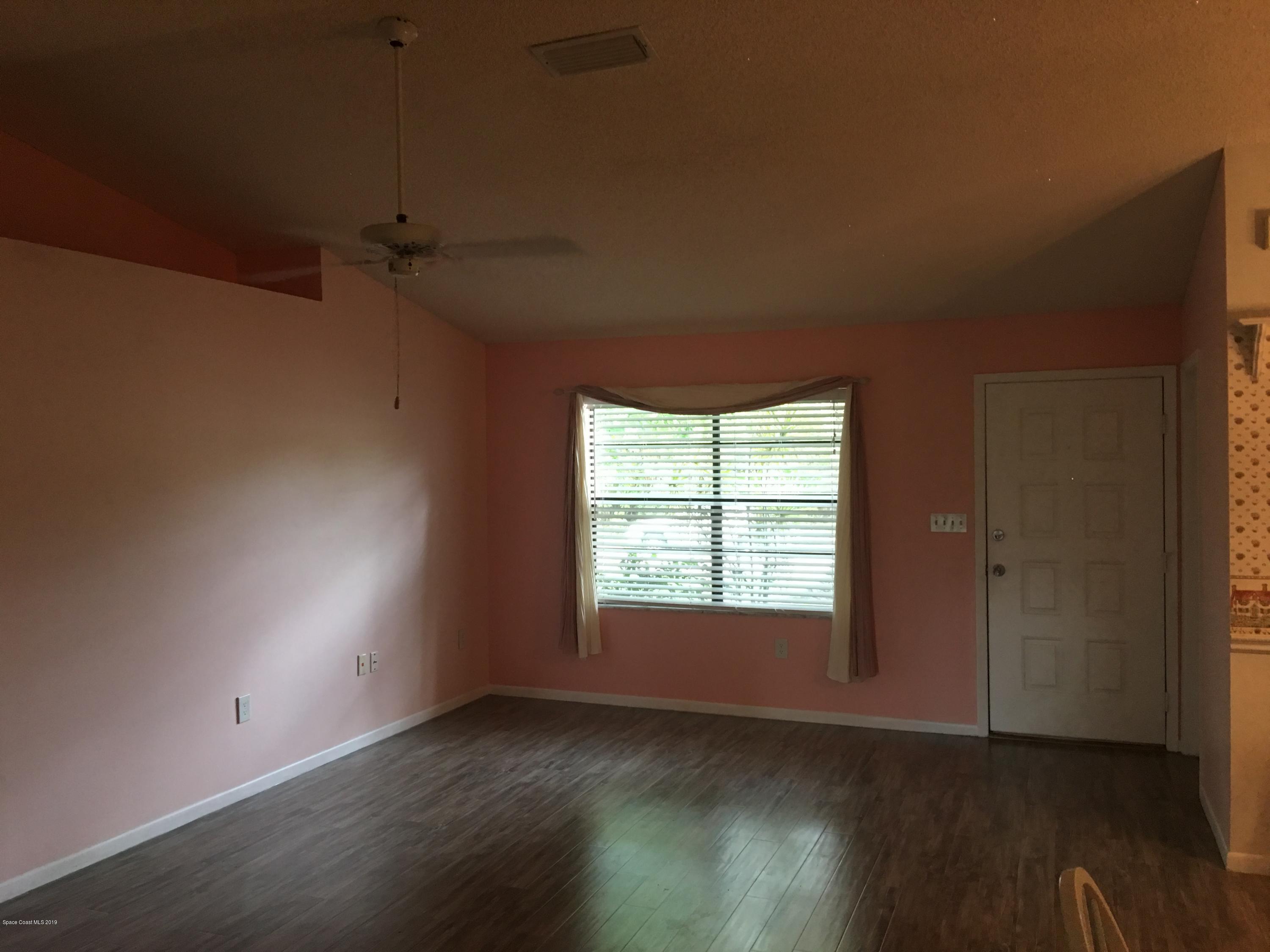 170 Santa Rosa Avenue Southwest Palm Bay, FL 32908 - Photo 5 of 32 Front Entrance - living room