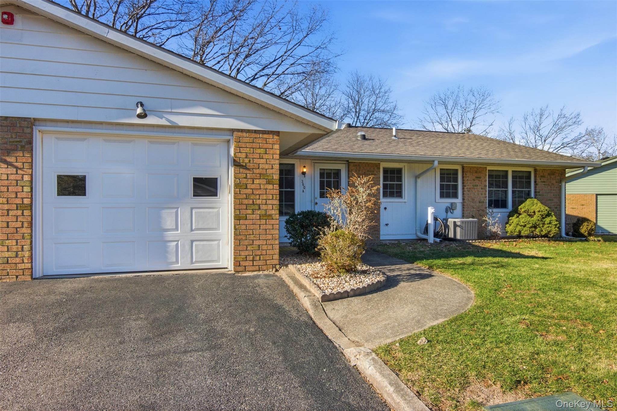 360 Woodbridge Drive, Unit A Ridge, NY 11961 - Photo 25 of 34 a view of a house with backyard porch and furniture